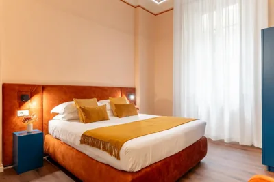 标准大床间 — Piccolo Hotel Puccini